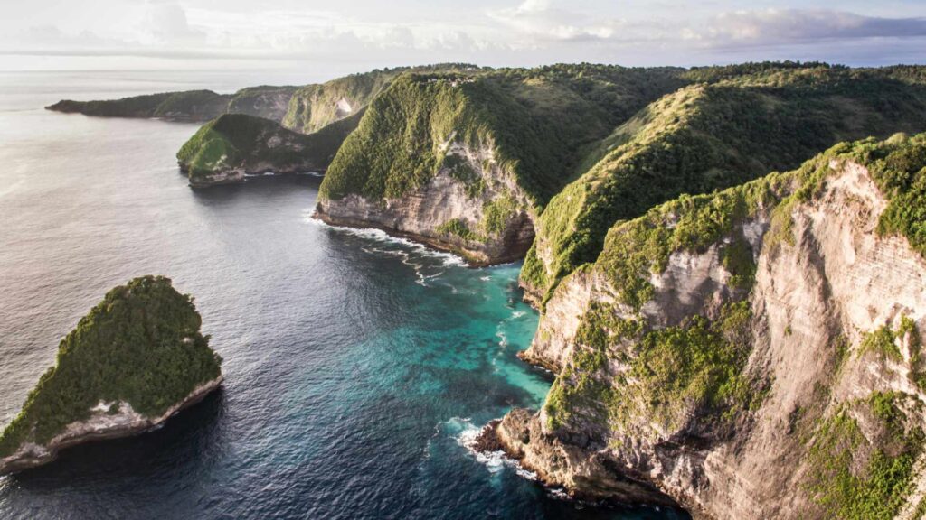 cliff beach nusa penida arial view